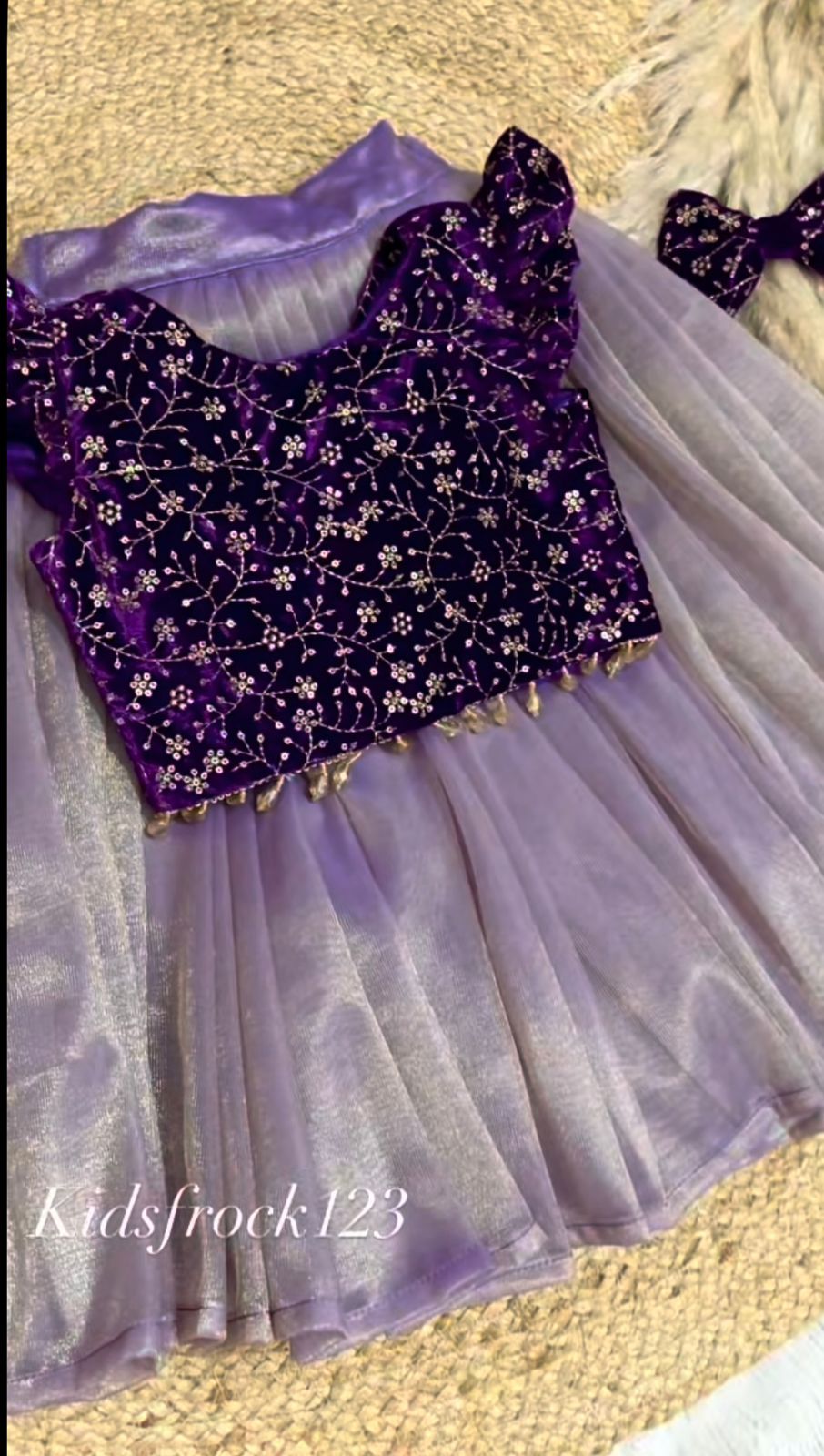 Festive Radiance: Girls' Purple Velvet Floral Sequinned Top & Lavender Twill Net Lehenga Set